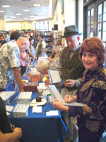 Patricia and Michael Signing Books